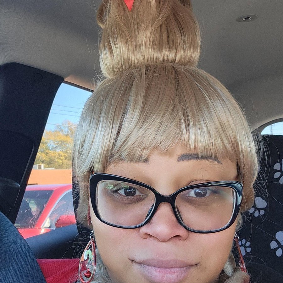 Shanina Guyton, Student Success Manager, dressed as Cindy Lou Who for the holidays